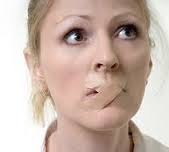 http://renewaldynamics.com/wp-content/uploads/2011/01/Woman-with-tape-on-her-mouth.jpg