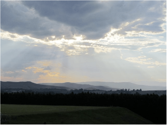 The view over the sports fields at Grace College. You can see the Drakensberg mountains from the school, and sometimes in the winter, you can see snow on them. 